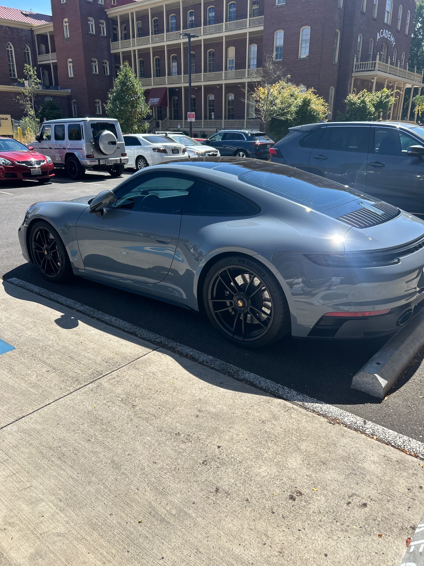 Gray Porsche 911 with clean glossy paint after mobile detailing